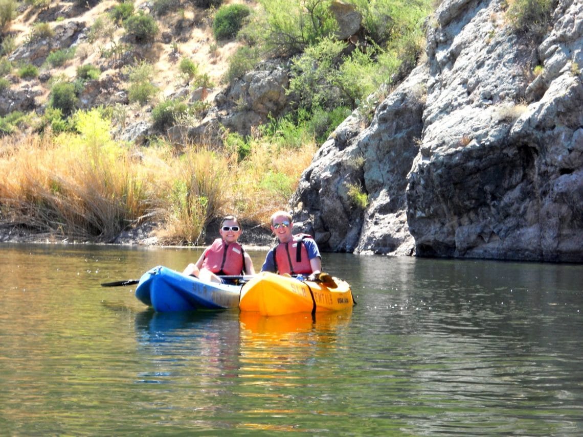 Kayaking date with couple kayaking the Salt River. 