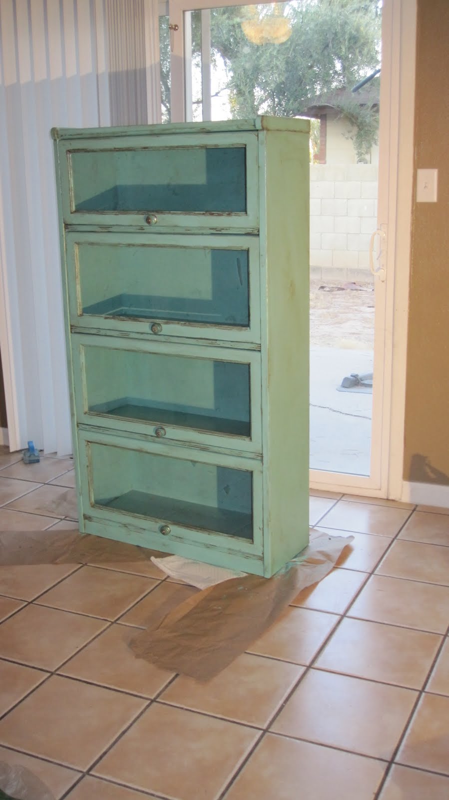 Turquoise bookcase. 