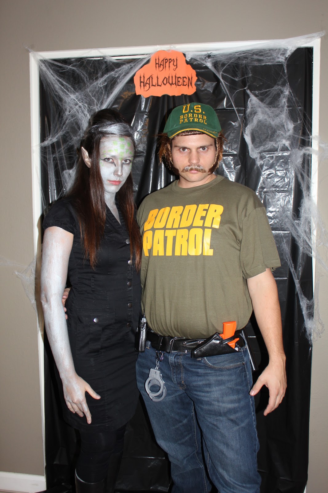 Alien and border patrol couple\'s costume. 