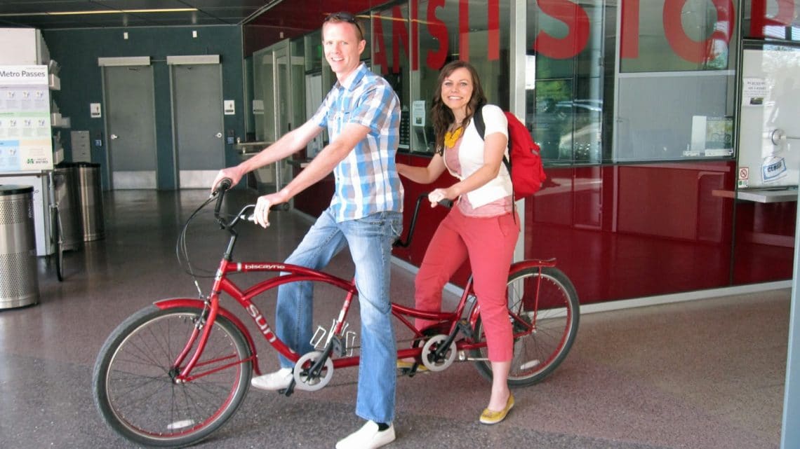 Couple riding a tandem bike. 