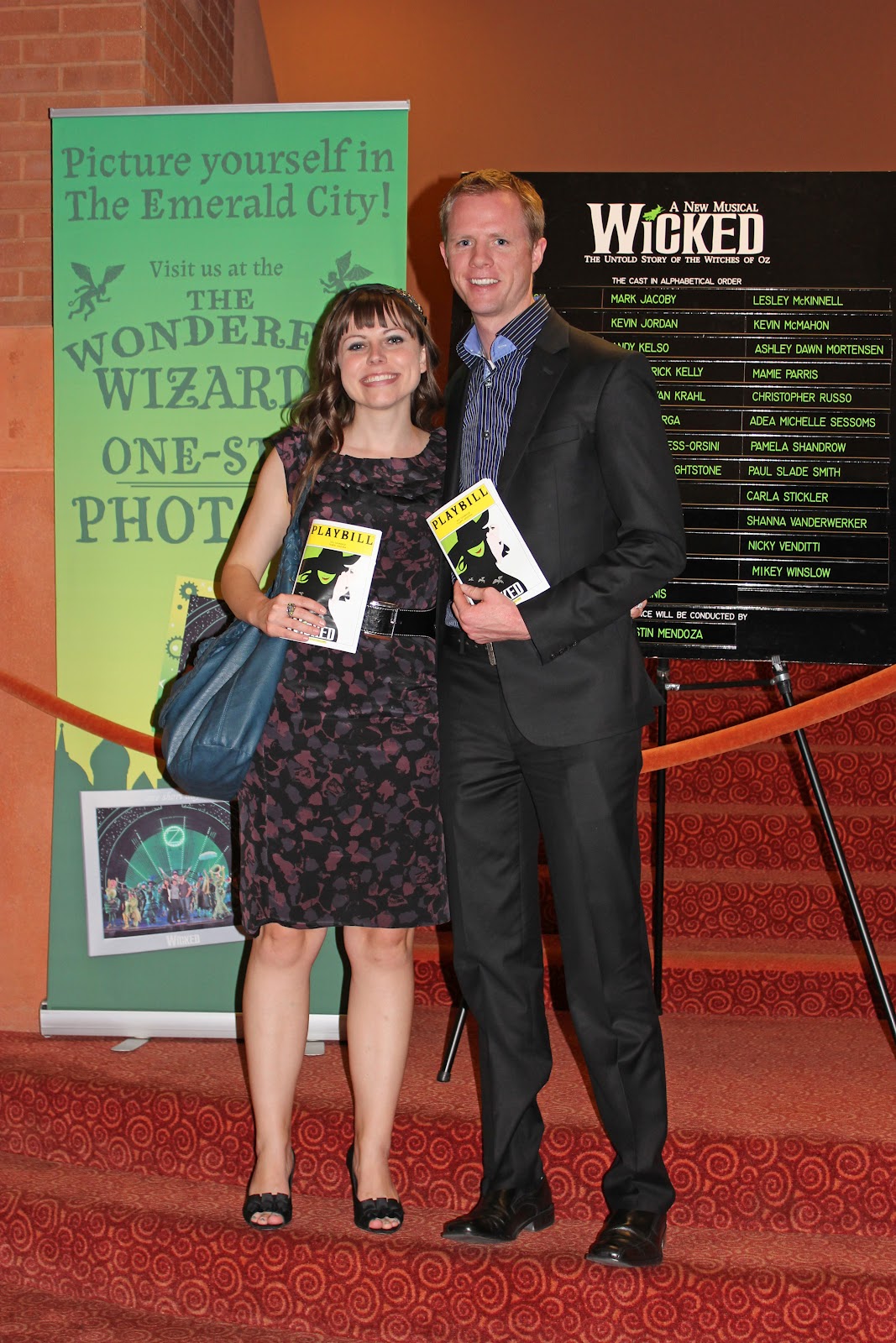 Couple out on a date night to see Wicked the Musical. 