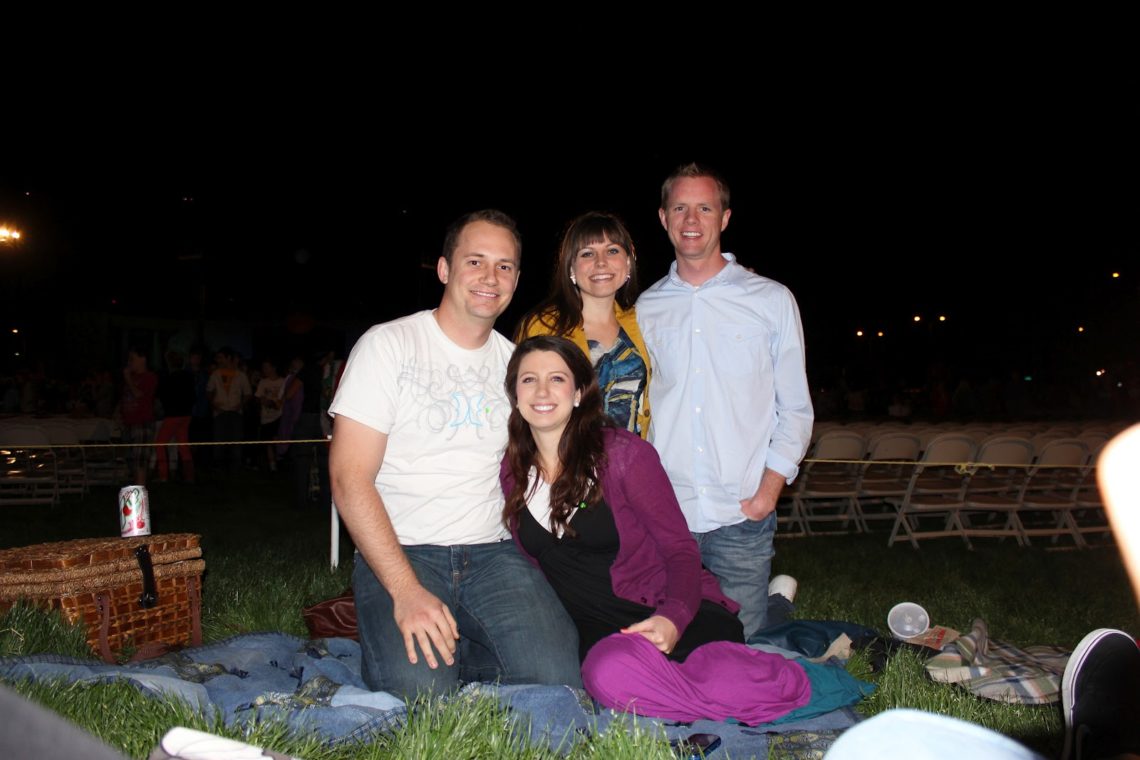 Two couples on a double date picnic. 