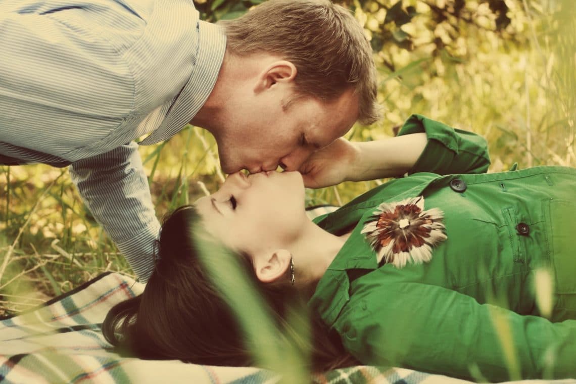 1st Anniversary photo shoot for couples kissing picture. 