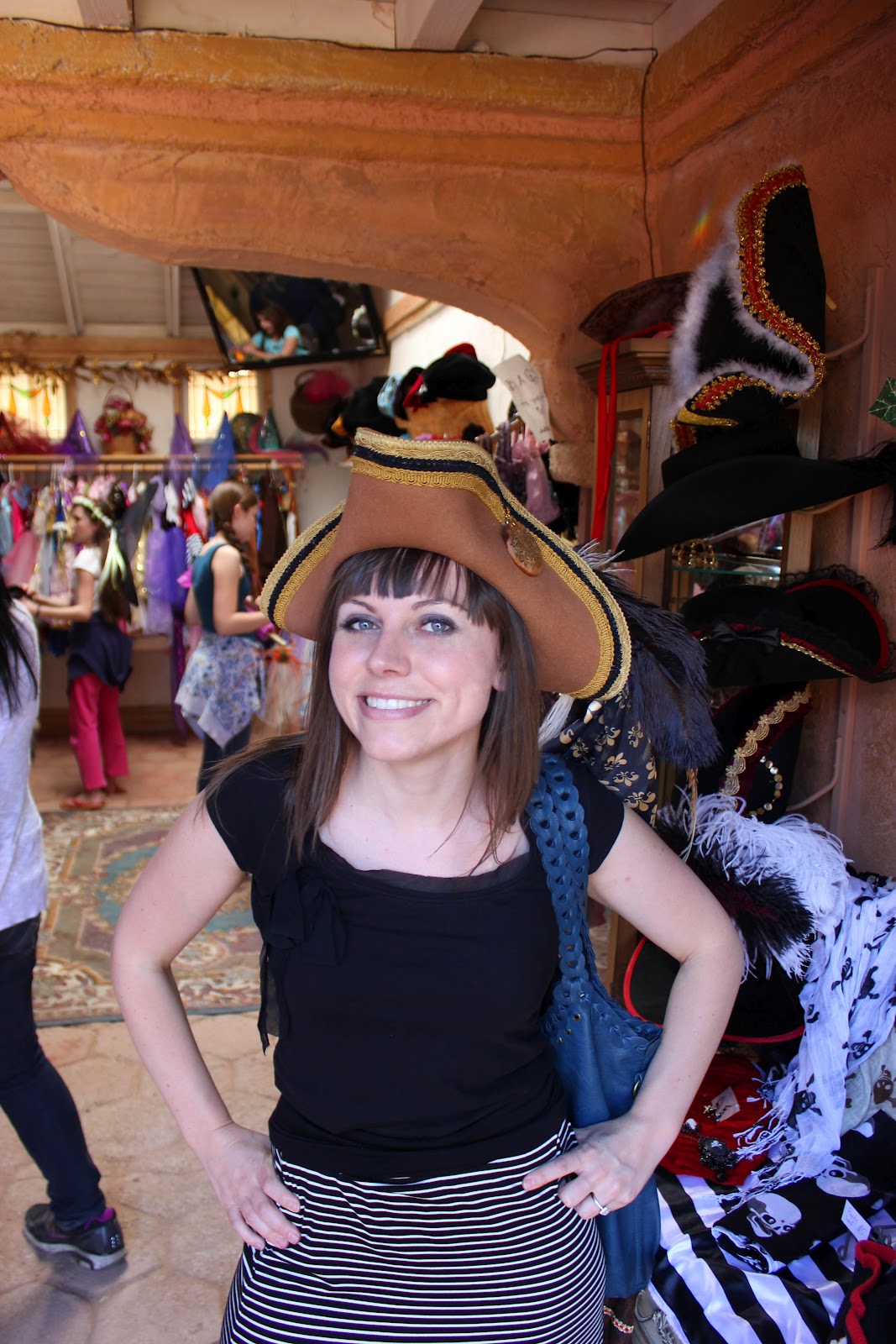 A woman modeling a hat for sale at the Renaissance Festival in Arizona. 