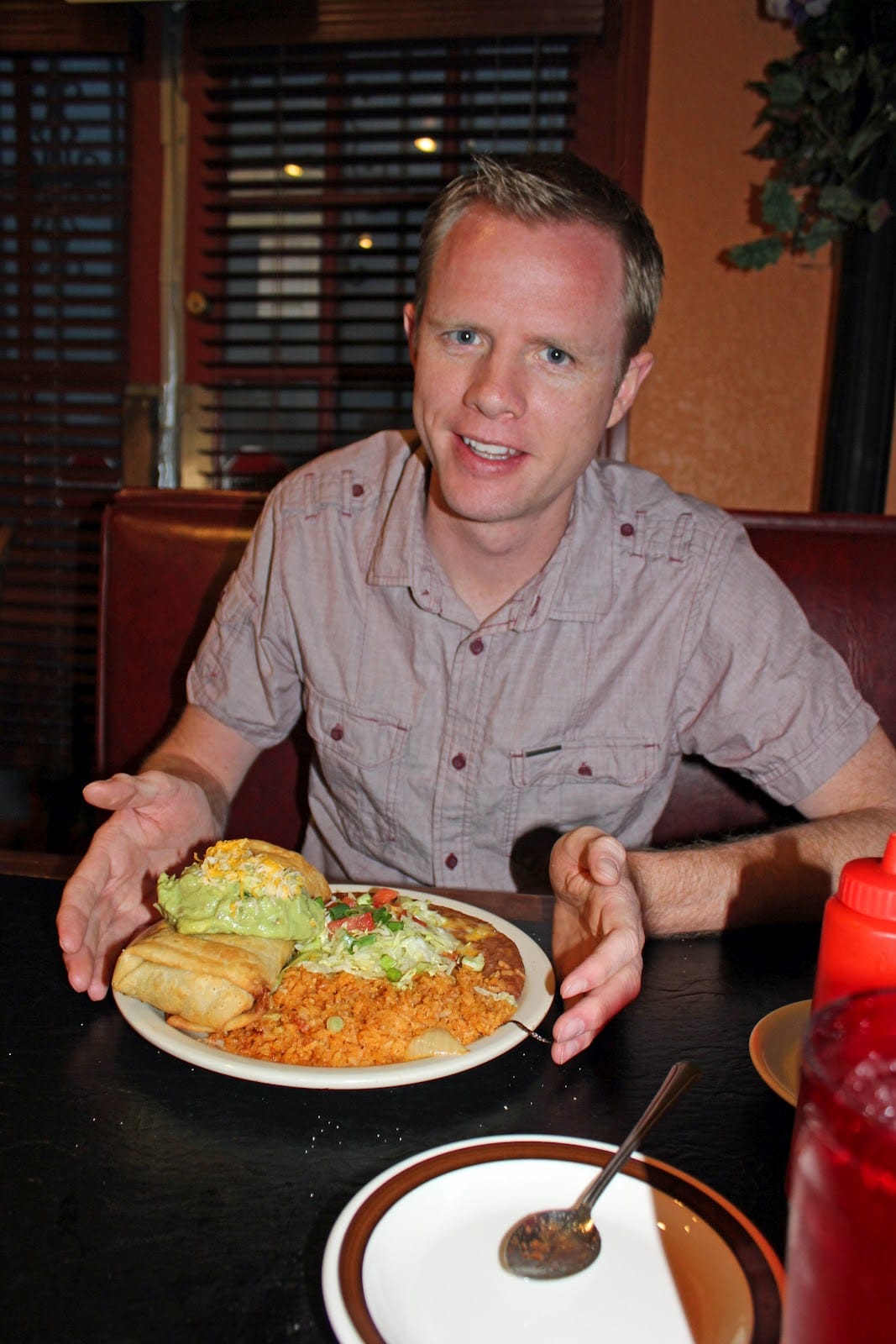 Man showing Excellent Mexican food in Downtown Phoenix. 