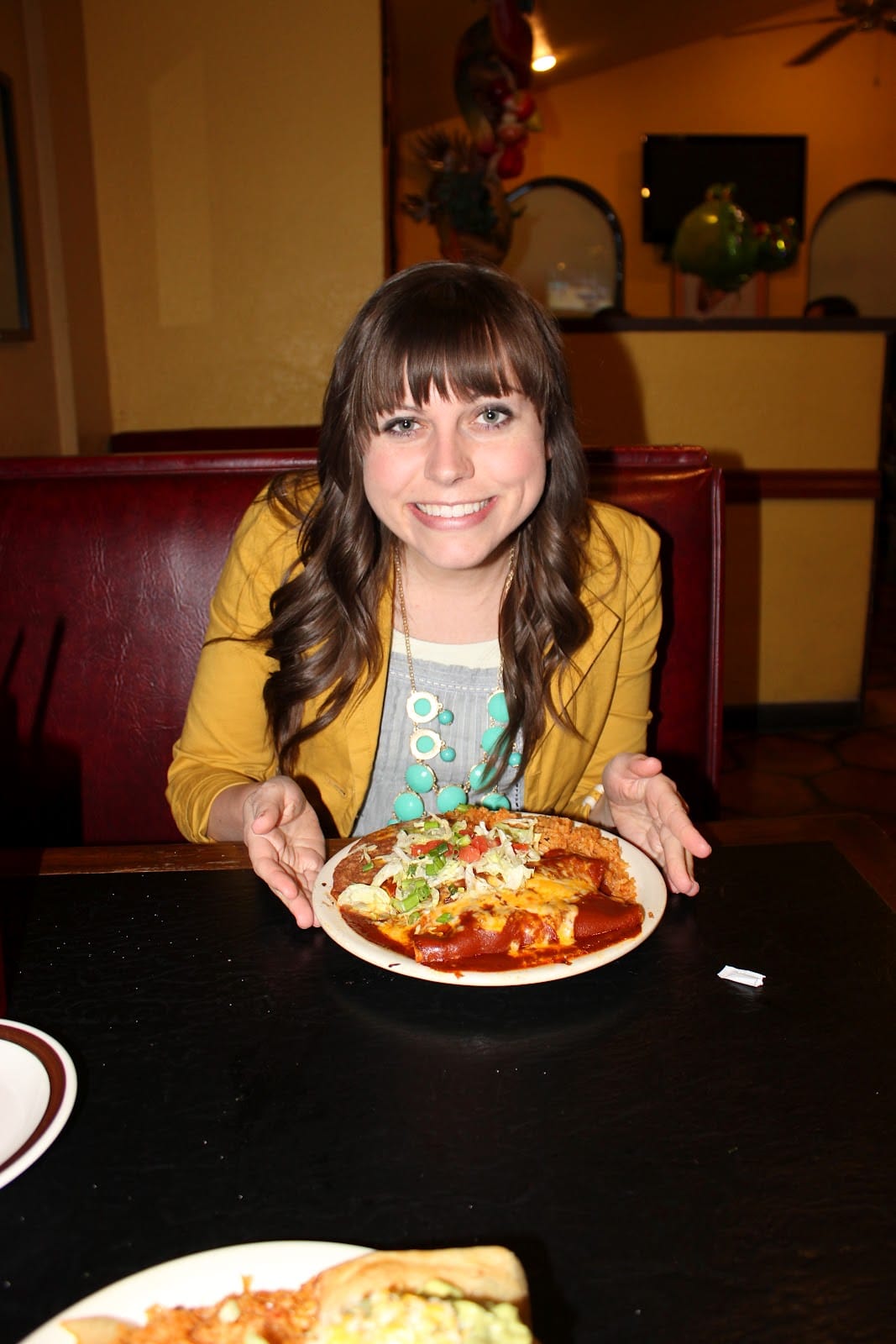 Woman showing Excellent Mexican food in Downtown Phoenix. 