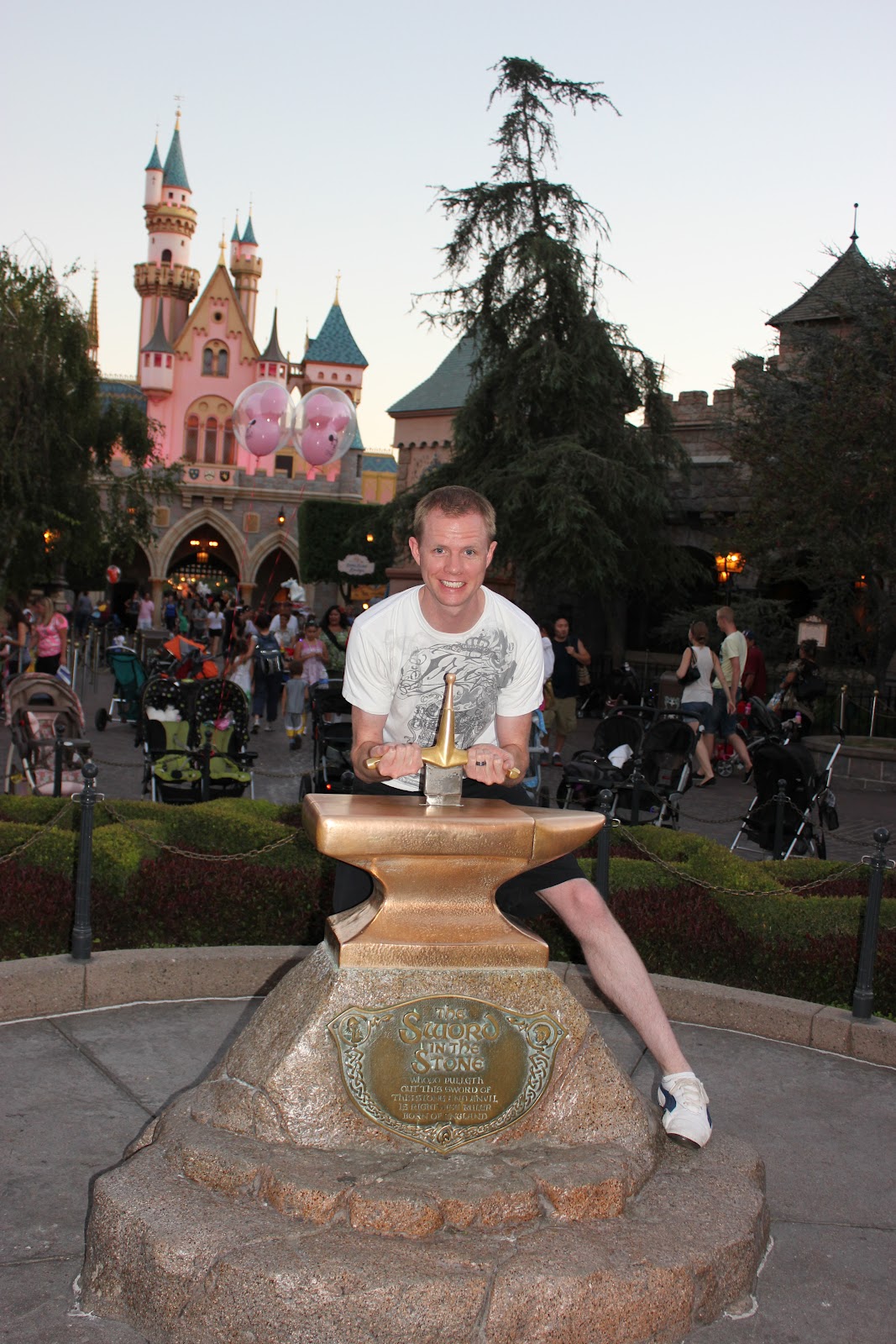 Disneyland date: couple with Mickey Mouse. 