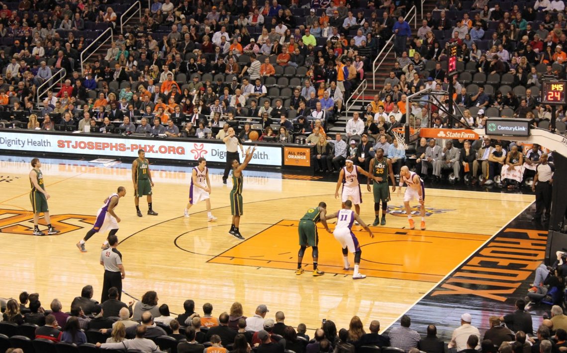 Couple on a date to a Sun's basketball game. 