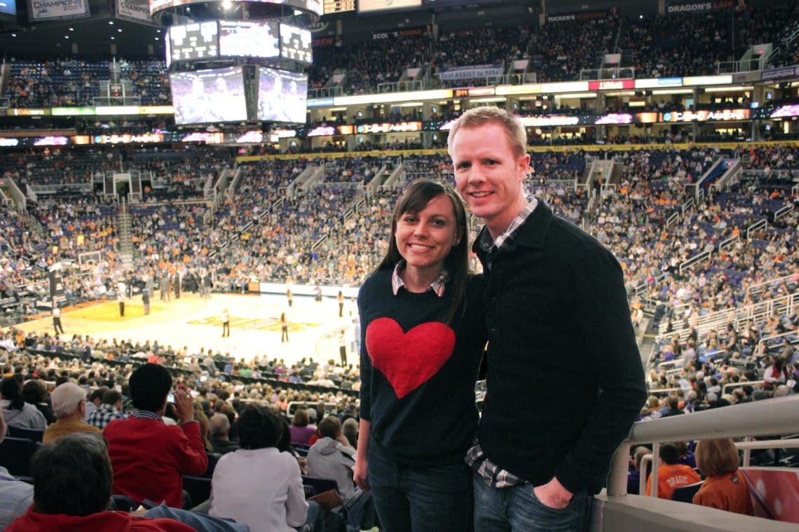 Couple on a date to a Sun's basketball game. 