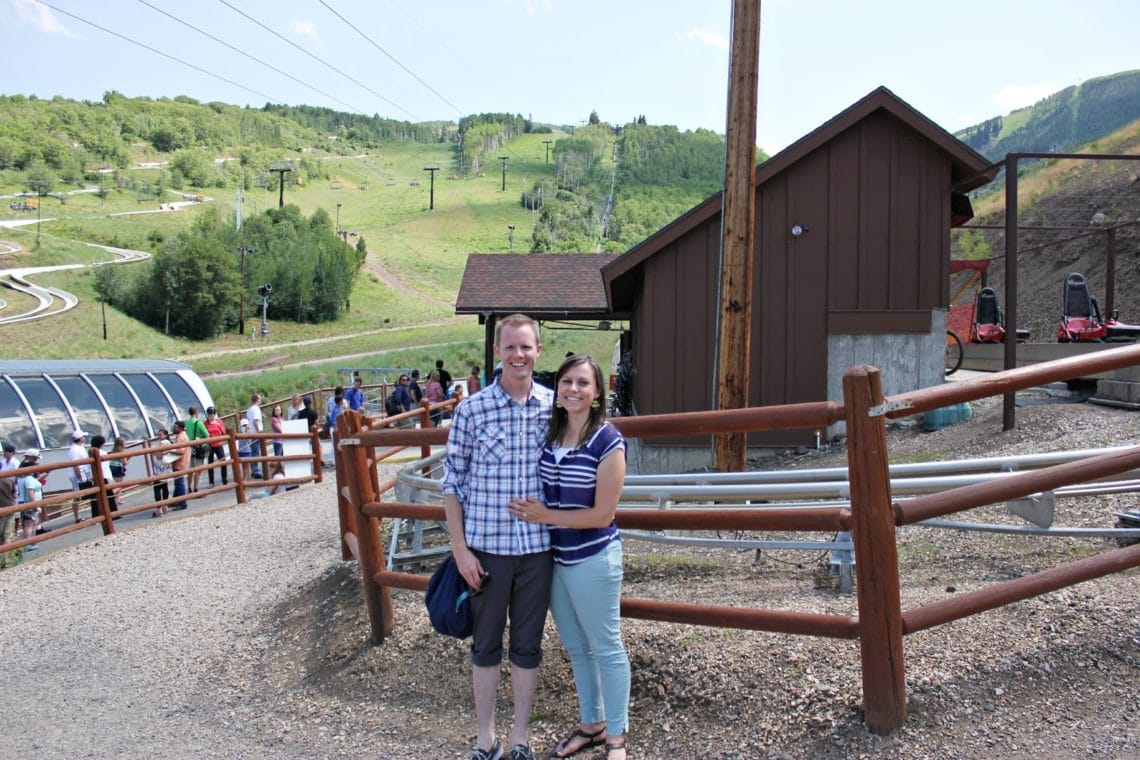 Utah Date Ideas, with couple ready to ride the Park City Alpine Coaster. 