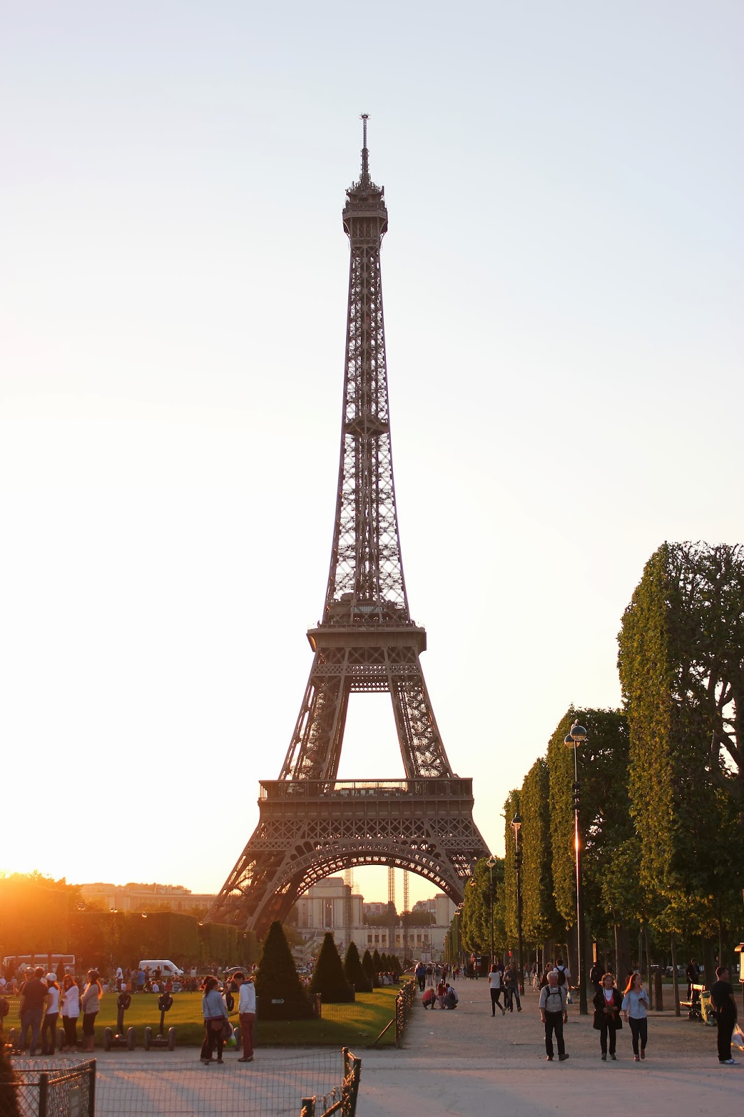 The sun setting behind the The Eiffel Tower. 