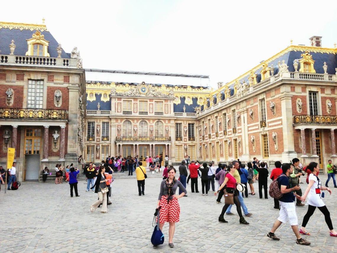 A woman Visiting Versailles Palace in France. 