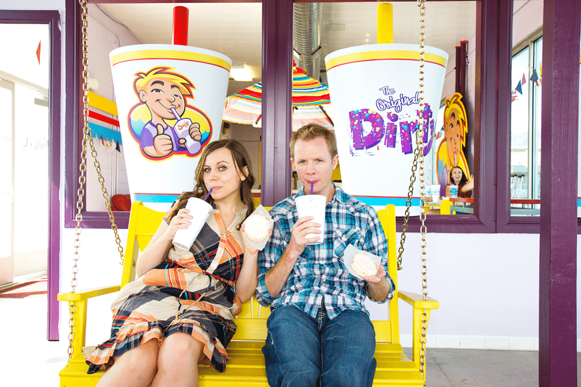 Couple enjoying drinks at the Swig Stop in Utah. 