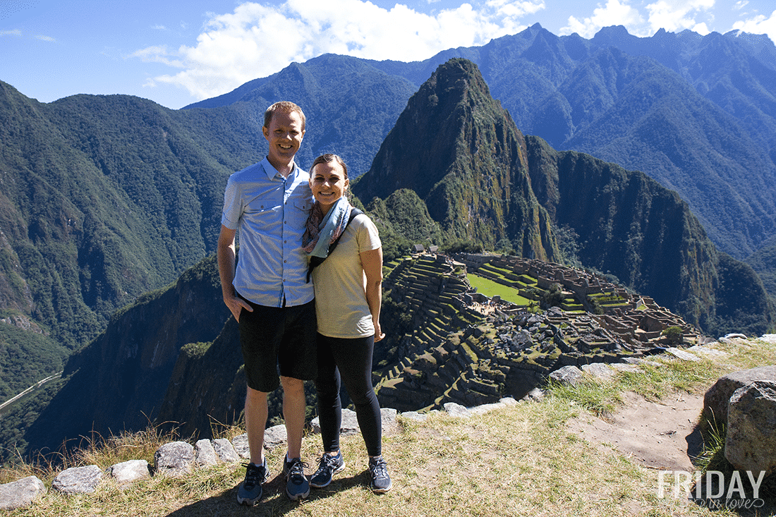 Couple touring Machu Picchu Peru. 