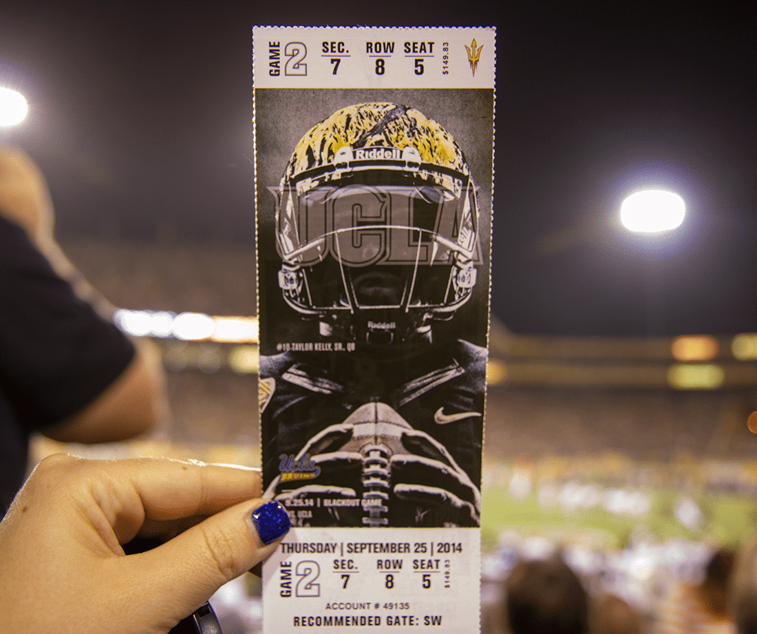 Ticket in front of the field during a College Football Game Date. 