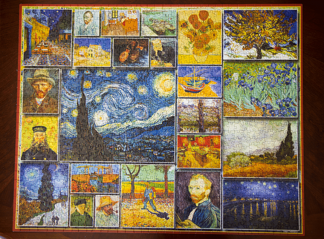 Completed Van Gogh jigsaw puzzle on a table. 