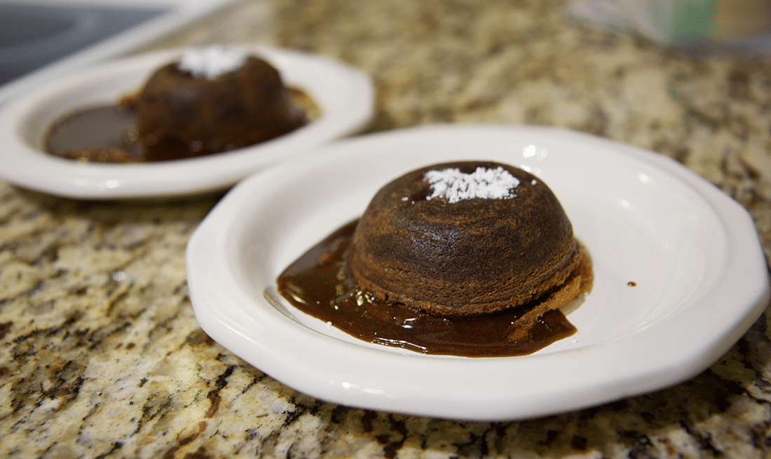 Two lava cakes on a counter made for date night at home. 