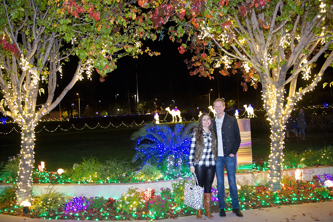 A couple on a date to see the Mesa Temple Christmas lights. 