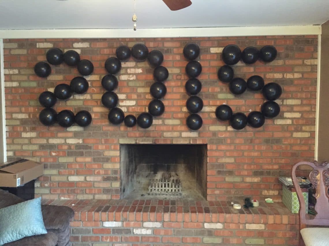 New Year\'s Eve party decorations on a budget balloon wall. 