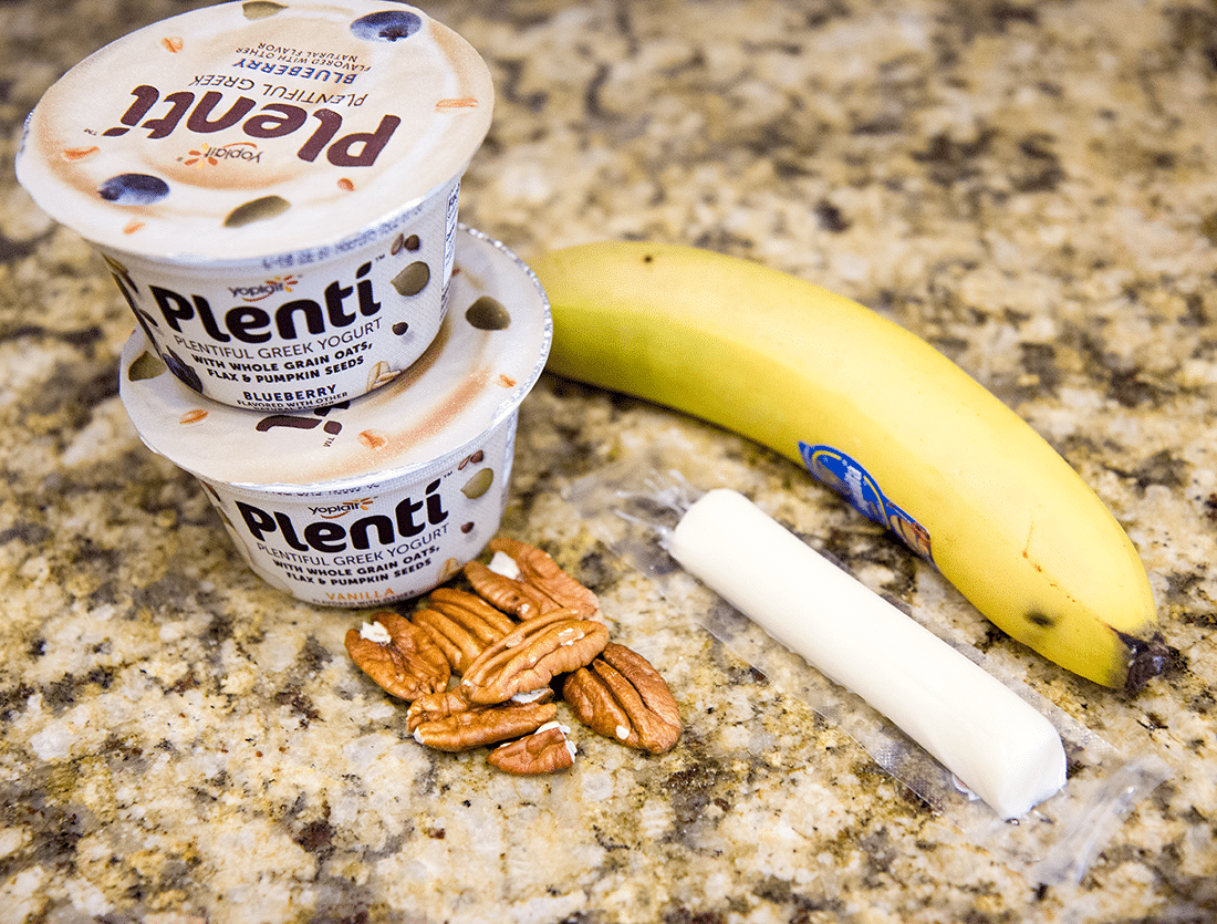 Greek yogurt and other gestational diabetes friendly snacks on a counter. 