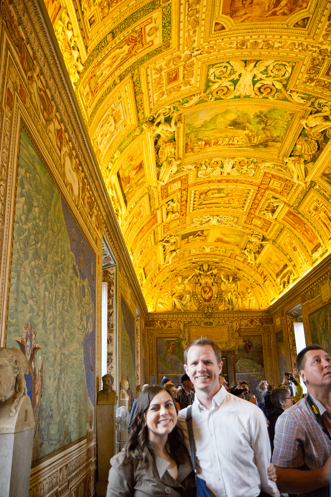 Visiting the Vatican in Rome, Italy. Posing in the Great Hall in the Vatican in Rome, Italy.