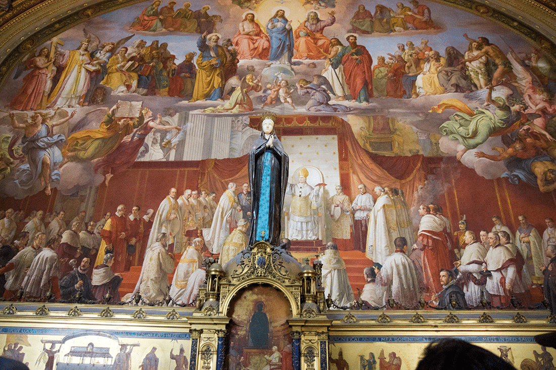 Visiting the Vatican in Rome, Italy. Murals in the Vatican in Rome, Italy.