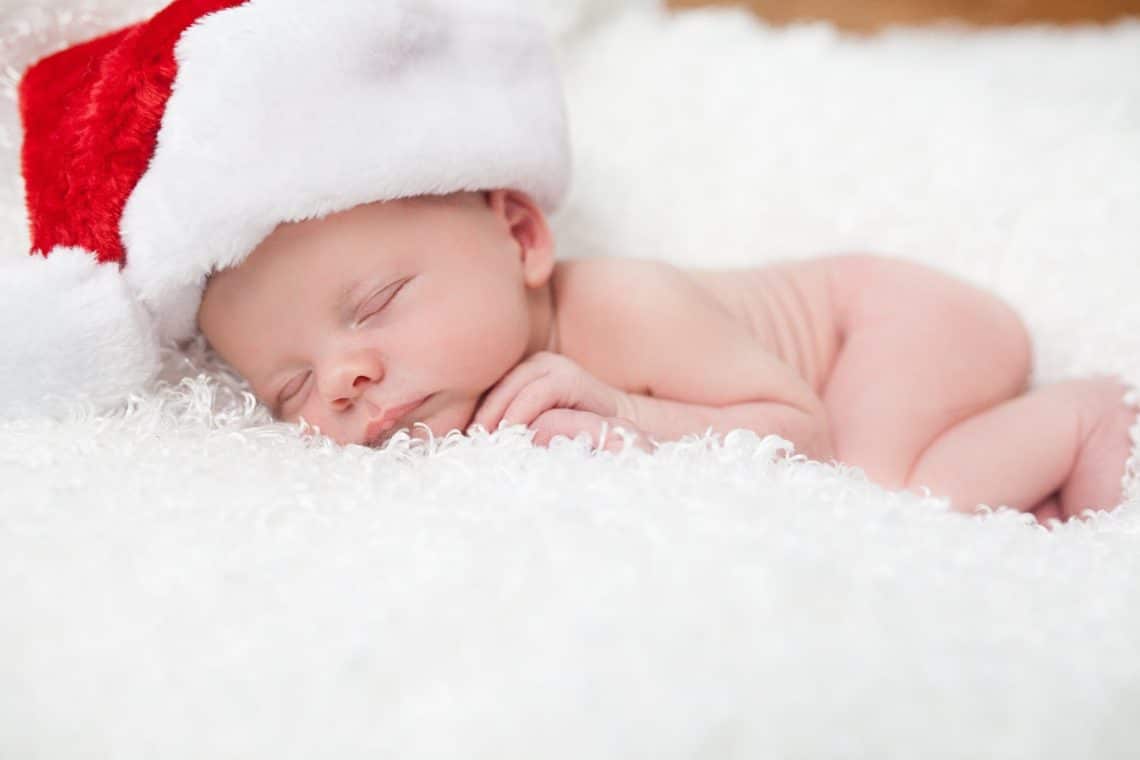Newborn Baby in a Santa Hat. 