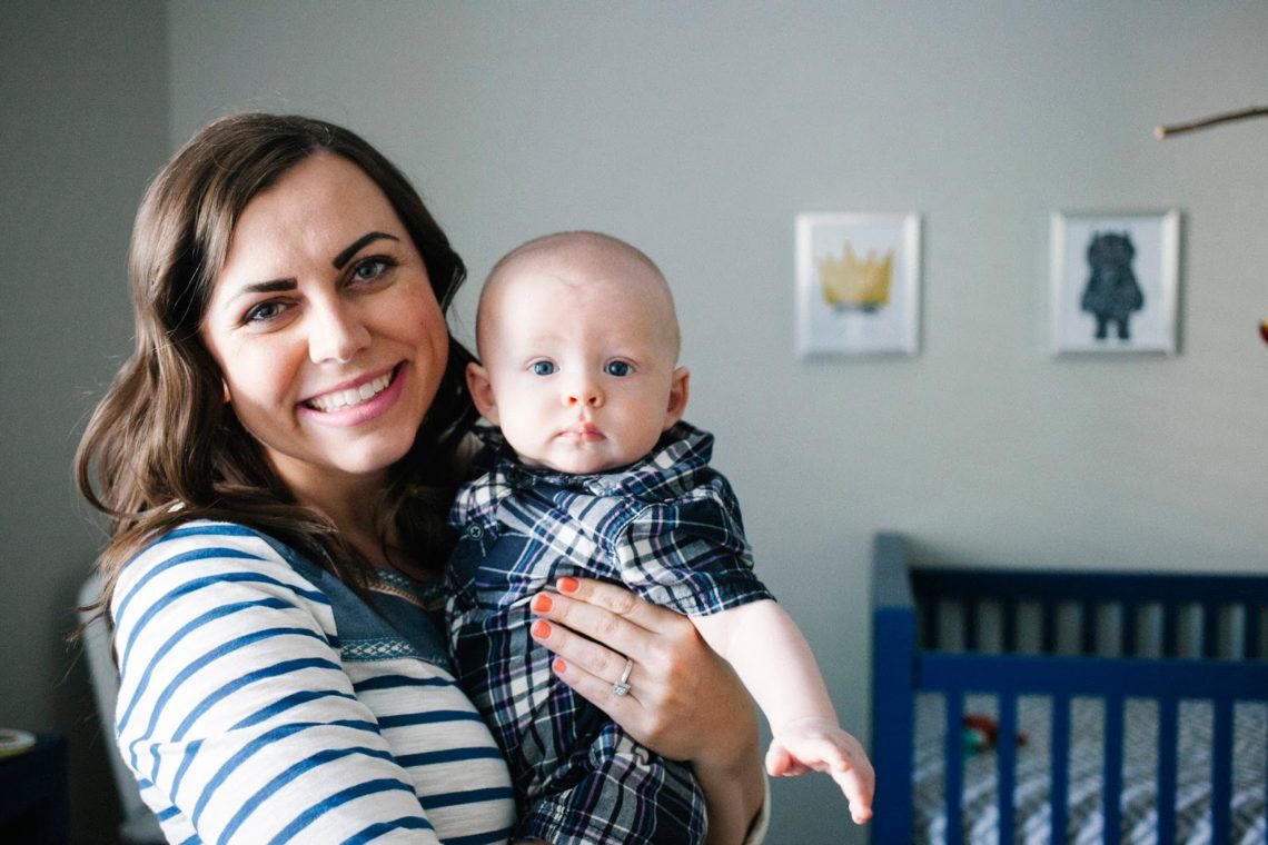 Mom holding her five month old baby. 