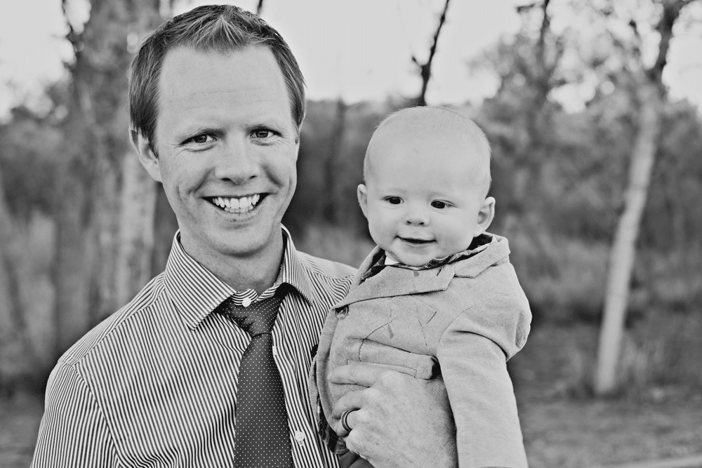 Young dad holding his baby. 