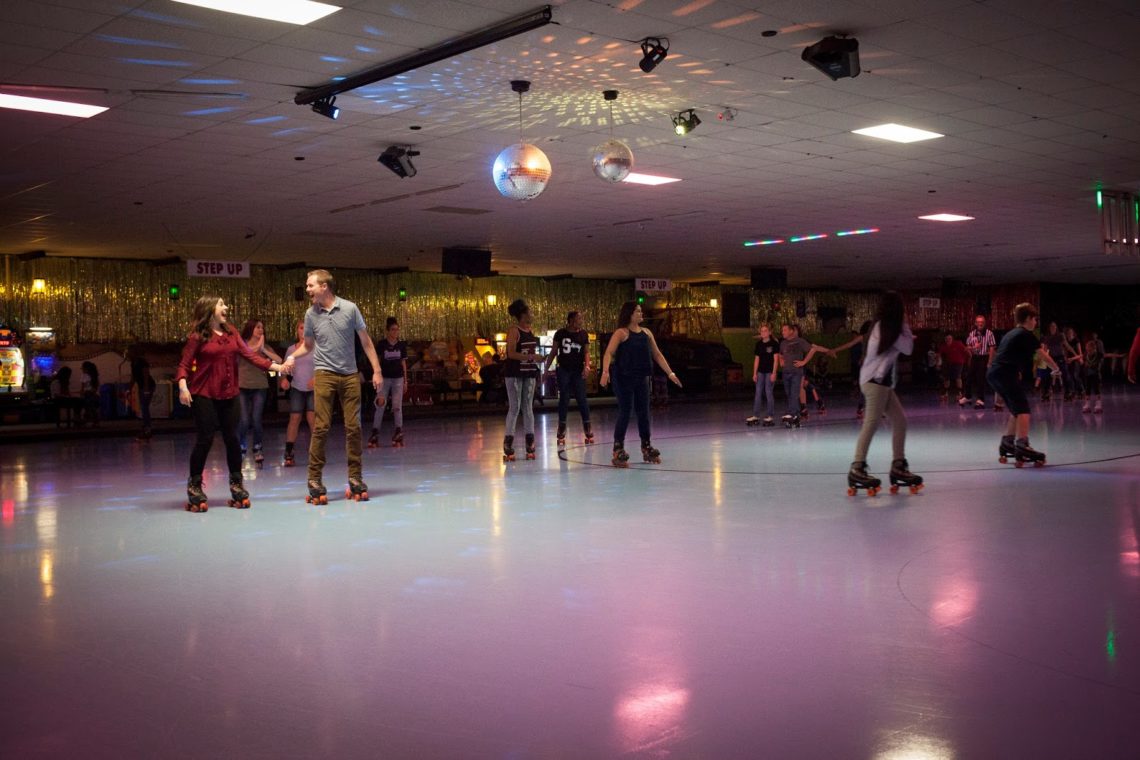 Couples roller skating. 