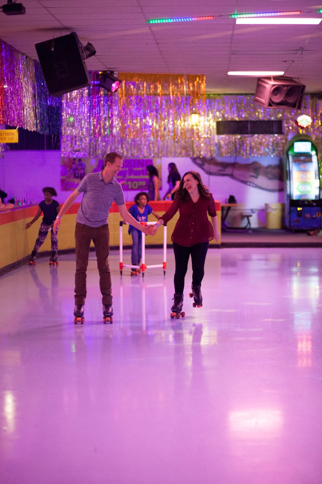 Couple roller skating together. 