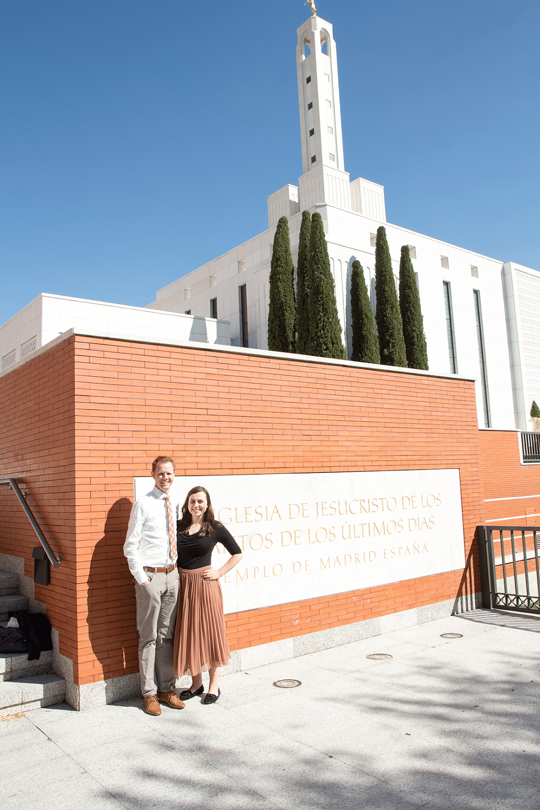 Young couple in front of the Madrid Spain LDS Temple. 