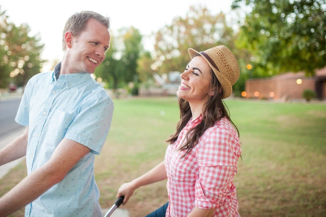 Cute couple on a bike. 