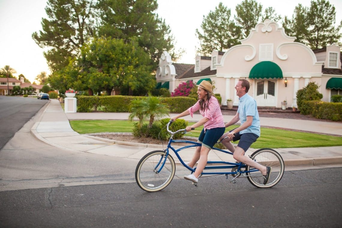 Couple on a tandem bike. 