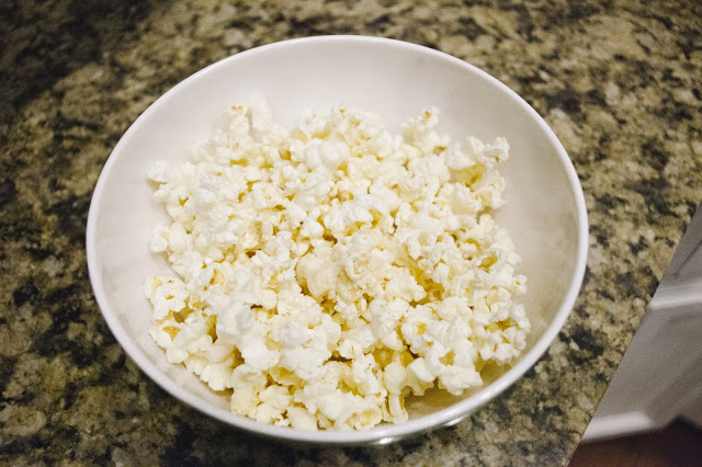 This easy white chocolate popcorn recipe comes together in minutes and is perfect for your next cozy movie date night at home.