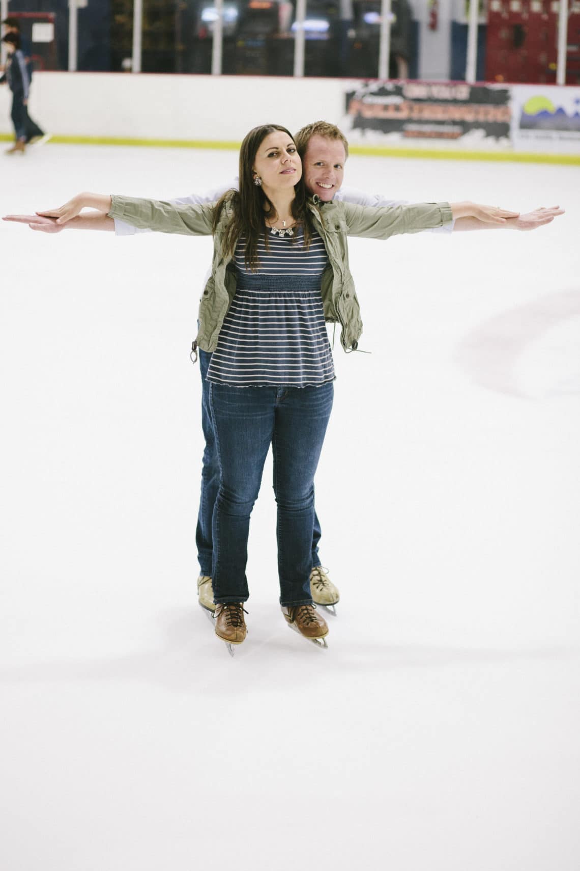 Couple on the ice for an Ice Skating Date Night. 