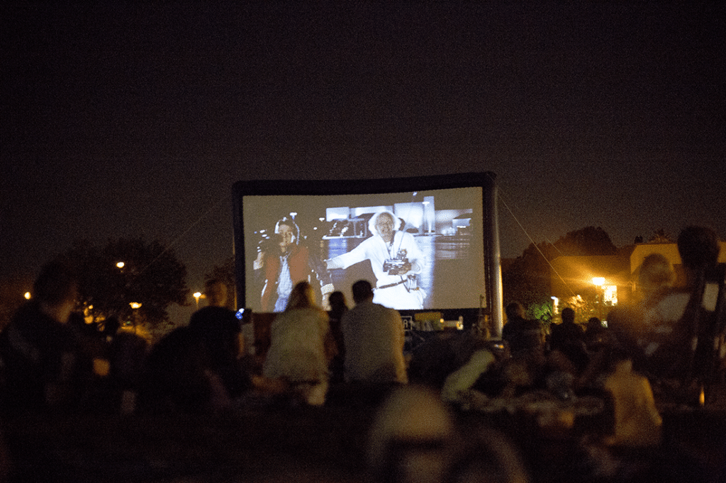 Perfect Creative Summer Date Idea: Head to the Street Food Cinema and grab amazing street food and enjoy a classic movie outdoors