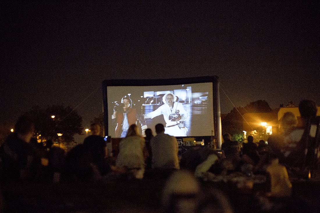 Watching a classic movie outdoors. 