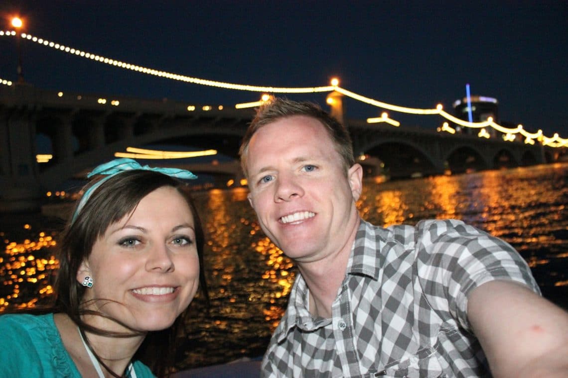 Couple enjoying one of their best date nights out on the lake. 