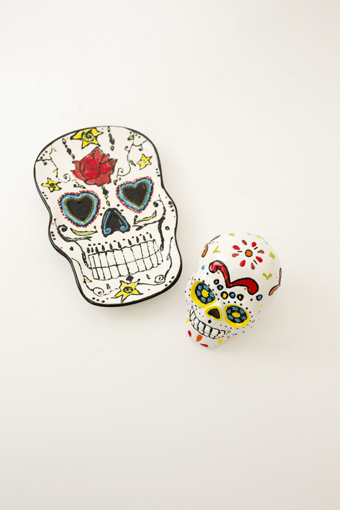 Paint your own pottery studio date night: Paint sugar skull pottery for the perfect creative date night! idea! 