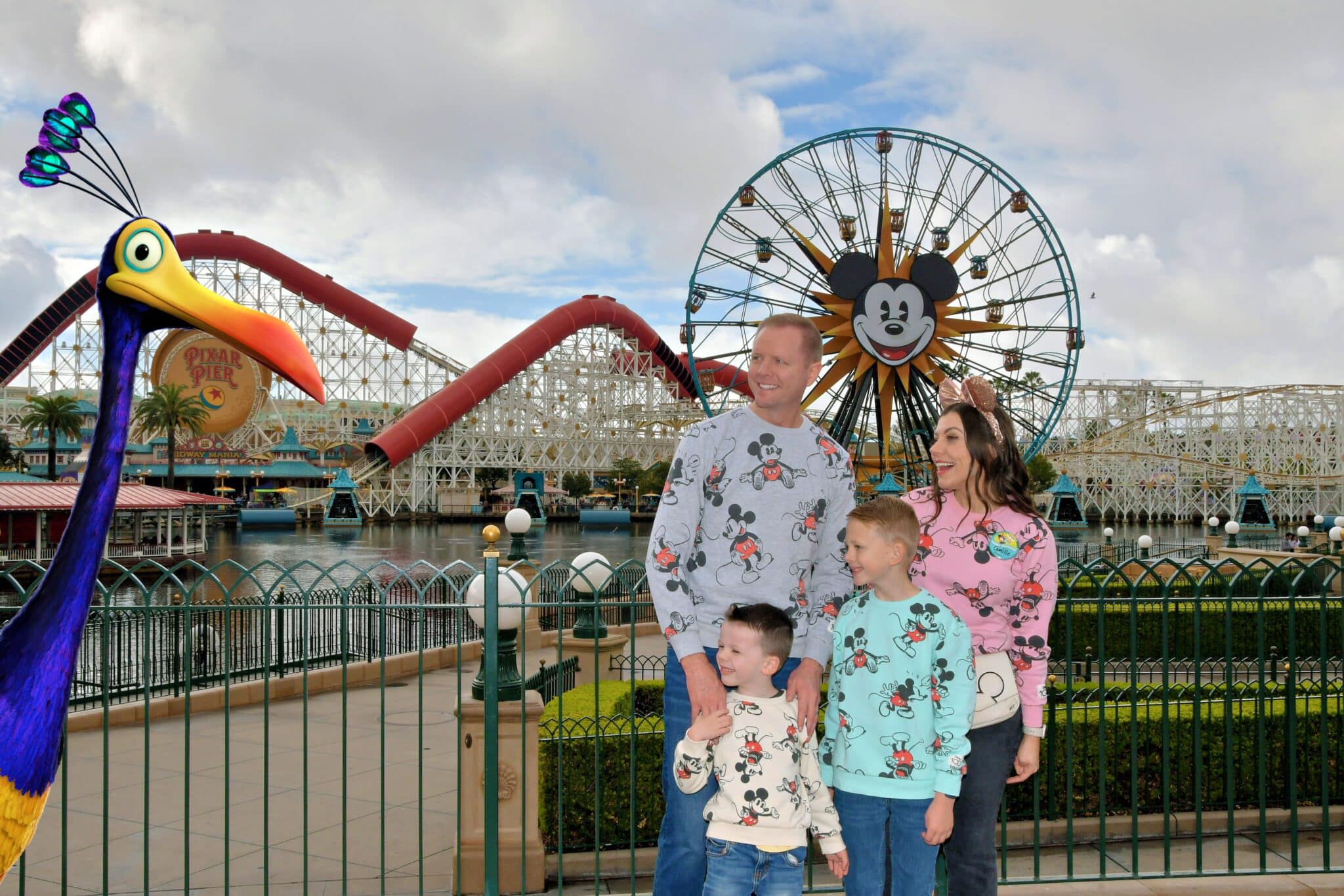 Disneyland photo Magic Shot in front of the Pixar Pal Around Mickey ferris wheel. 