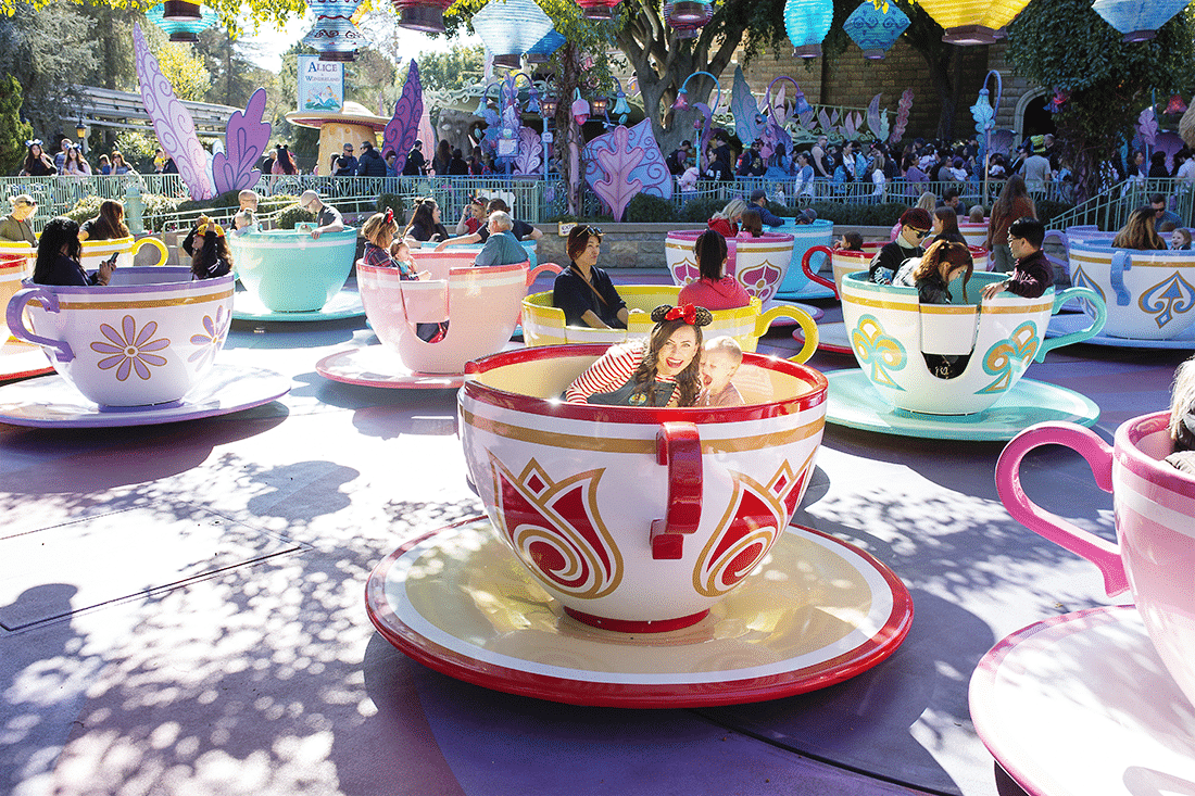 Must Take Disneyland Picture Ideas: The Most Instagramable Disneyland Spots including a mom and son riding the teacups. 