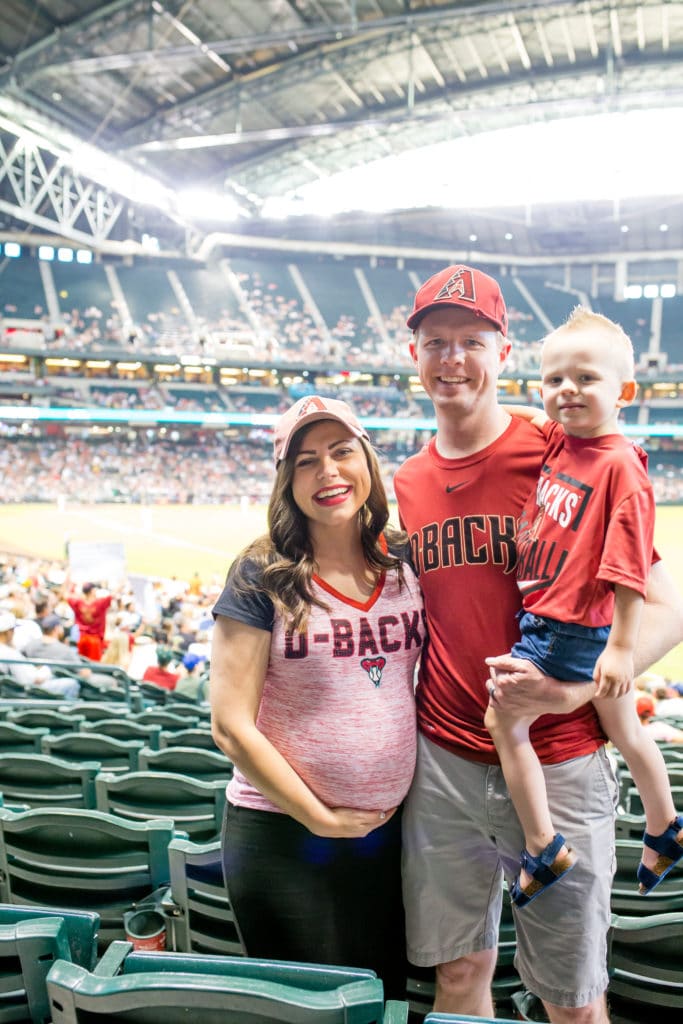 Family at a major league baseball game for a family date night. 