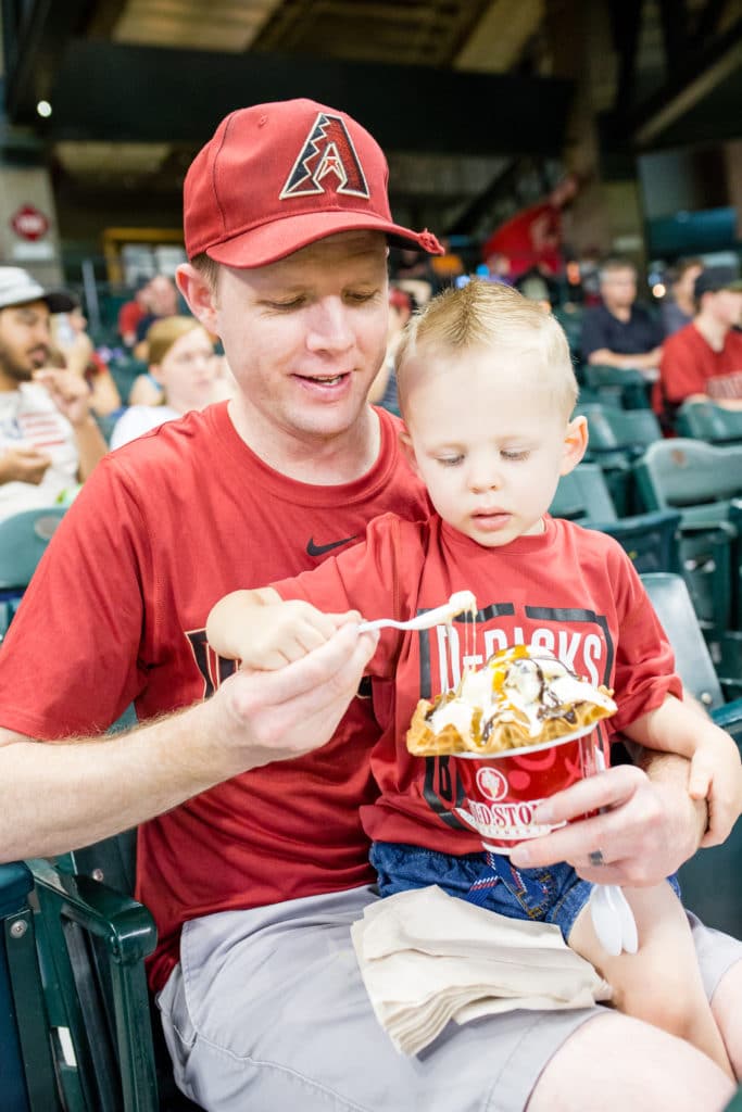 Getting ice cream at a Diamondback\'s baseball game. 