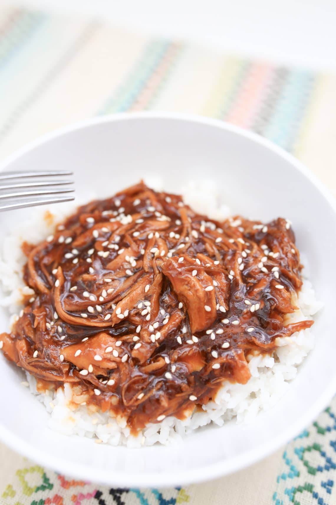 This honey sesame chicken Crock Pot recipe is such a winner! It's sweet, savory, the right amount of spicy, and it comes together in minutes. Plus it's a chicken Crock Pot freezer meal that tastes amazing on round two! Crock Pot Honey sesame chicken recipe.