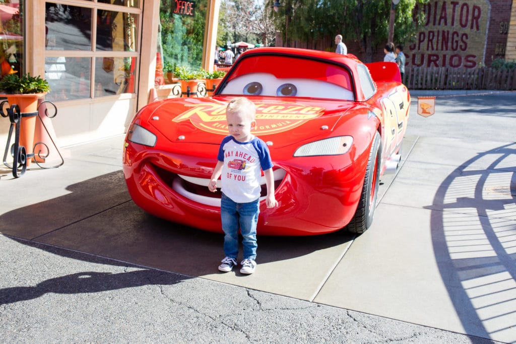 Disneyland with toddlers visiting Lightening McQueen. 