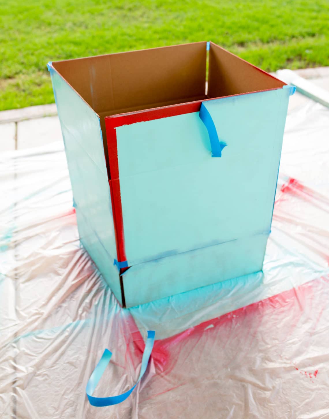 Looking for an easy Halloween costume you can make with little time and money? This DIY robot costume upcycles a box and a few easy supplies (you may have on hand) and comes together quickly and easily for an amazingly cute and cool vintage robot costume! #diy #halloweencostumes #robot #robotcostume #diycostume Robot costume from a cardboard box.