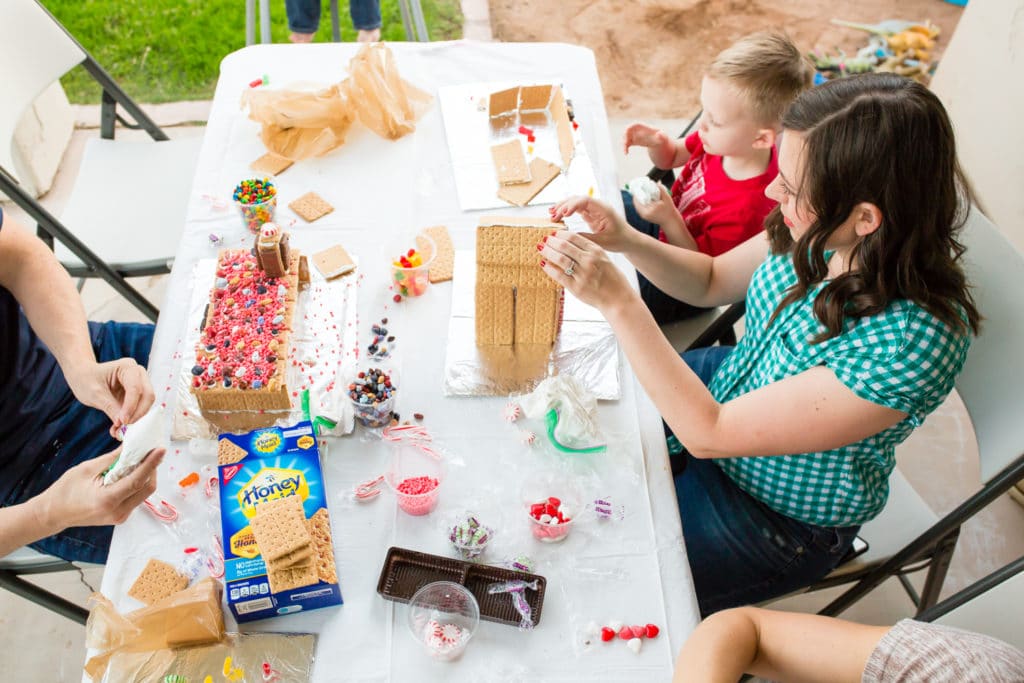 Holiday houses party creating gingerbread houses out of graham crackers. 