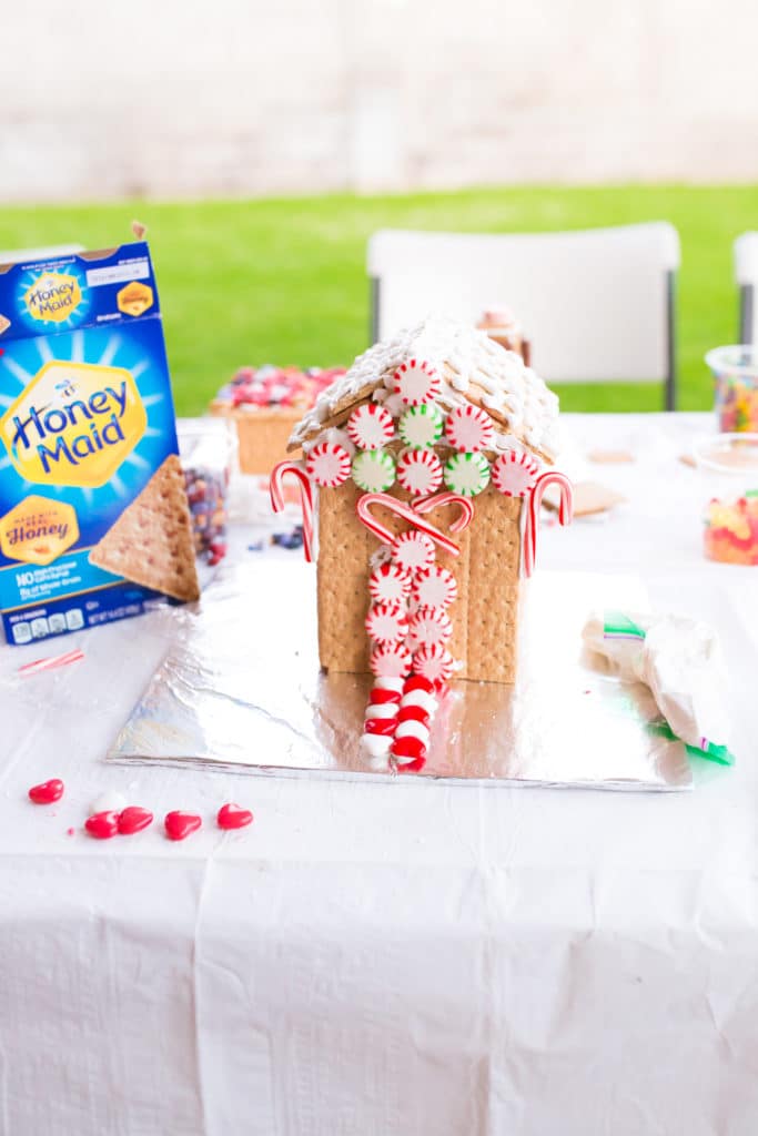 Making gingerbread houses at home. 