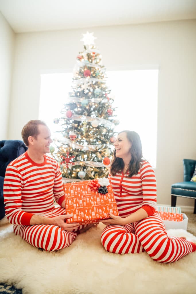 A couple wearing matching pajamas for couples. 